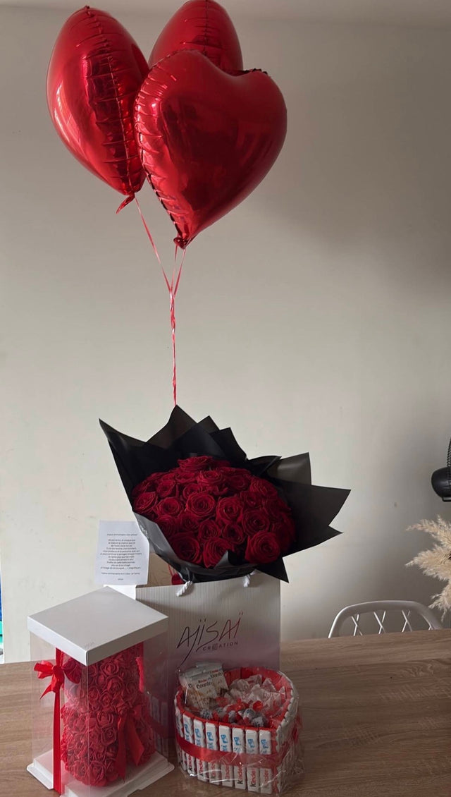 Bouquet de roses rouges, ours en roses, cœur en chocolat et ballons cœur livrés